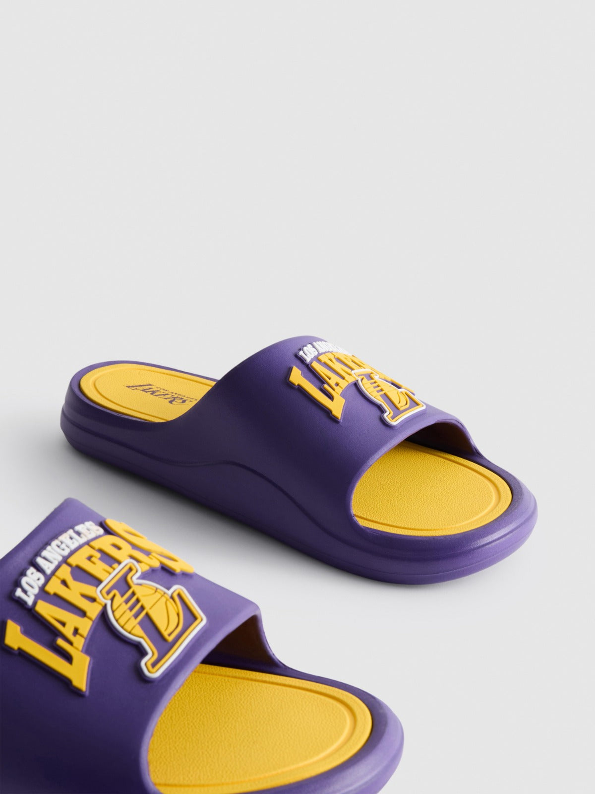 Claquette Los Angeles Lakers